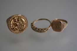 A 9ct gold signet ring, a 9ct gold seven stone eternity style ring and a 9ct gold St Christopher