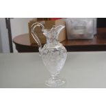 A 19thc baluster water jug with allover engraved clematis leaf and flower decoration (stress mark to