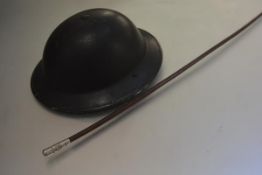 A WWI Royal Scots leather swagger stick with plated mount (l.70cm), a military safety fuse igniter