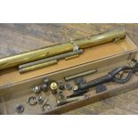A Clarksons Optical Stores Holburn, London, brass telescope with eight various optical lenses,