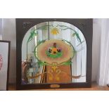 A mahogany arched framed pub mirror handpainted in Art Nouveau style, with reverse painted panel,