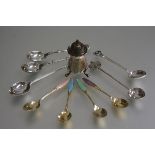 A Birmingham silver baluster pepper pot, a pair of Epns spoons, a Sheffield silver egg spoon with