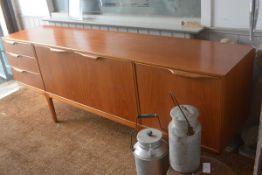 A McIntosh & Co., Ltd., Kirkcaldy, teak longjohn style sideboard, the rectangular top with moulded