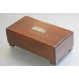 A mahogany musical cigarette box, the rectangular hinged top with presenation plaque, D Ferguson