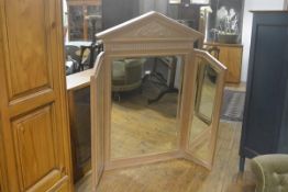 A light ash finish Adam style pedimented mirror with urn and laurel wreath frieze, above a