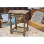 An oak miniature occasional table, the rectangular top with moulded edge raised on turned baluster