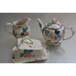 A Royal Winton Strawberry pattern spongeware decorated part breakfast set including milk jug, teapot