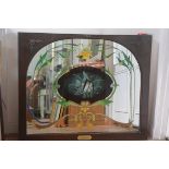 A mahogany framed arched pub mirror with reverse painted panel, depicting an Angel Fish,