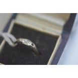 A palladium 5055 two stone ring (one a/f) (1.4g)