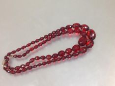 Two vintage oval faceted bead single strand necklaces, possibly amber. 48cm and 42cm, length of