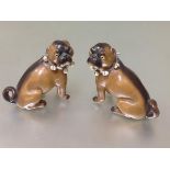 A pair of late 19th century porcelain models of seated pugs, possibly Conta & Boehme, after