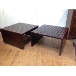 A pair of 1970's rosewood coffee or cocktail tables, each of slatted design. 44cm by 77cm by 75cm