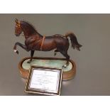 A Royal Worcester porcelain limited edition model of a Hackney Stallion, by Doris Lindner, mounted