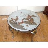 A 1920's silver lacquer Chinoiserie low table, probably Hille of London, the circular top