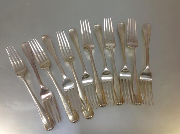 A set of twelve George V Scottish silver table forks, Brook & Son, Edinburgh 1929 and 1933,