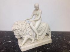 A mid-19th century Minton Parian figure group, Una and the Lion, after a design by John Bell, made