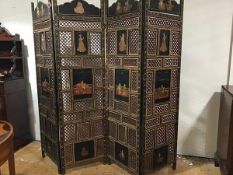 An Indian painted wooden four-fold room screen, each leaf painted with courtly figures and lovers