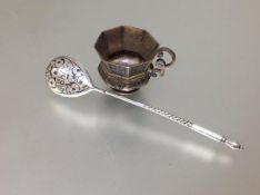 A Russian silver small cup, bearing Moscow 84 Zolotnik mark for 1860, of octagonal baluster form,