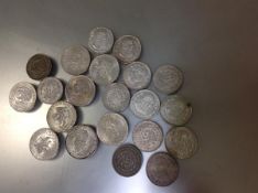 A group of Mexican coins: 13 X 1 peso (10% silver), 21g fine and 8 others (72% silver 133.2g)