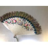 A Qing dynasty painted feather and peacock feather fan, late 19th century, the white feathers