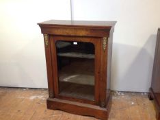 A mid-Victorian gilt-metal mounted inlaid walnut pier cabinet, the rectangular top with moulded edge