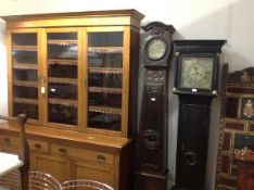 A French 19th century oak cased longcase clock, the small circular brass dial with Roman numerals