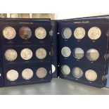 Two Whitman albums containing a group of c. 38 Morgan dollars 1878-1921, 900 standard, no