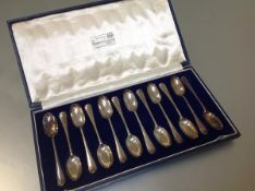 A cased set of twelve George V silver teaspoons, Goldsmiths & Silversmiths Company, London 1935,