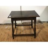 An oak side table composed of some 18th century elements, the rectangular top over four slender
