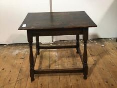 An oak side table composed of some 18th century elements, the rectangular top over four slender