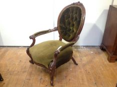 A late Victorian walnut-framed lady's drawing room or nursing chair in the French taste, the oval