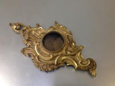 A small French gilt-bronze cartel clock case, in the Rococo taste, 19th century, the circular dial