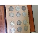 A group of approximately 23 US Peace dollars 1922-35 including mint marks (missing 1921),