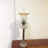 An Edwardian silver-plated columnar oil lamp, Collis & Co., the fluted column raised on a stepped