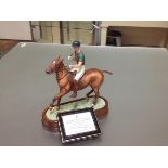 A Royal Worcester limited edition porcelain model of H.R.H. The Duke of Edinburgh, mounted on a polo