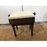 An early Victorian rosewood adjustable piano stool, the rectangular stuffed-over seat over a box
