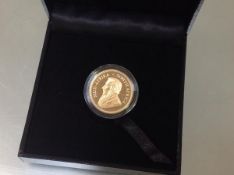 A 1/2 oz Krugerrand proof, dated 2017, with South African Mint certificate, boxed