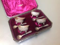 A cased set of four Victorian silver salts and spoons, James Dixon & Son, Sheffield 1891, each of