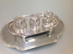 A George III silver inkstand, Solomon Hougham, London 1799, of rectangular form with bowed ends, the