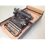 A travelling cased folding Corona typewriter no. 3. Case 12cm by 28cm by 24.5cm