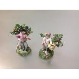 Two Walton style Staffordshire pearlware bocage figures, 19th century, one modelled as a huntsman, a