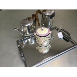 A two piece Piquot ware set comprising teapot and hot water jug, an Art Deco chromium plated