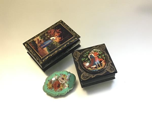 Two Russian treen rectangular boxes decorated in traditional style (larger: 3cm x 9cm x 6cm) and