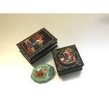 Two Russian treen rectangular boxes decorated in traditional style (larger: 3cm x 9cm x 6cm) and