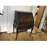 A late George II/early George III mahogany bureau on later stand, the slat front bureau (possibly