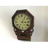 A Victorian Sunderland figured walnut brass inlaid octagonal wall clock with enamelled dial and twin