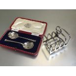 A pair of Hamilton & Inches silver jam spoons, complete with fitted case (42.19g) and a Hamilton &