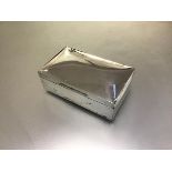 A Birmingham silver rectangular cigarette case with engraved family crest, marks rubbed (h. 5cm