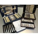 A case containing six pairs of Epns fish knives and forks, a canteen of fish servers and six pairs