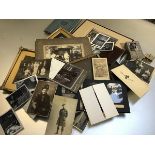 A collection of photographs including a 19thc Reverend and his family, 1920s photographs, school